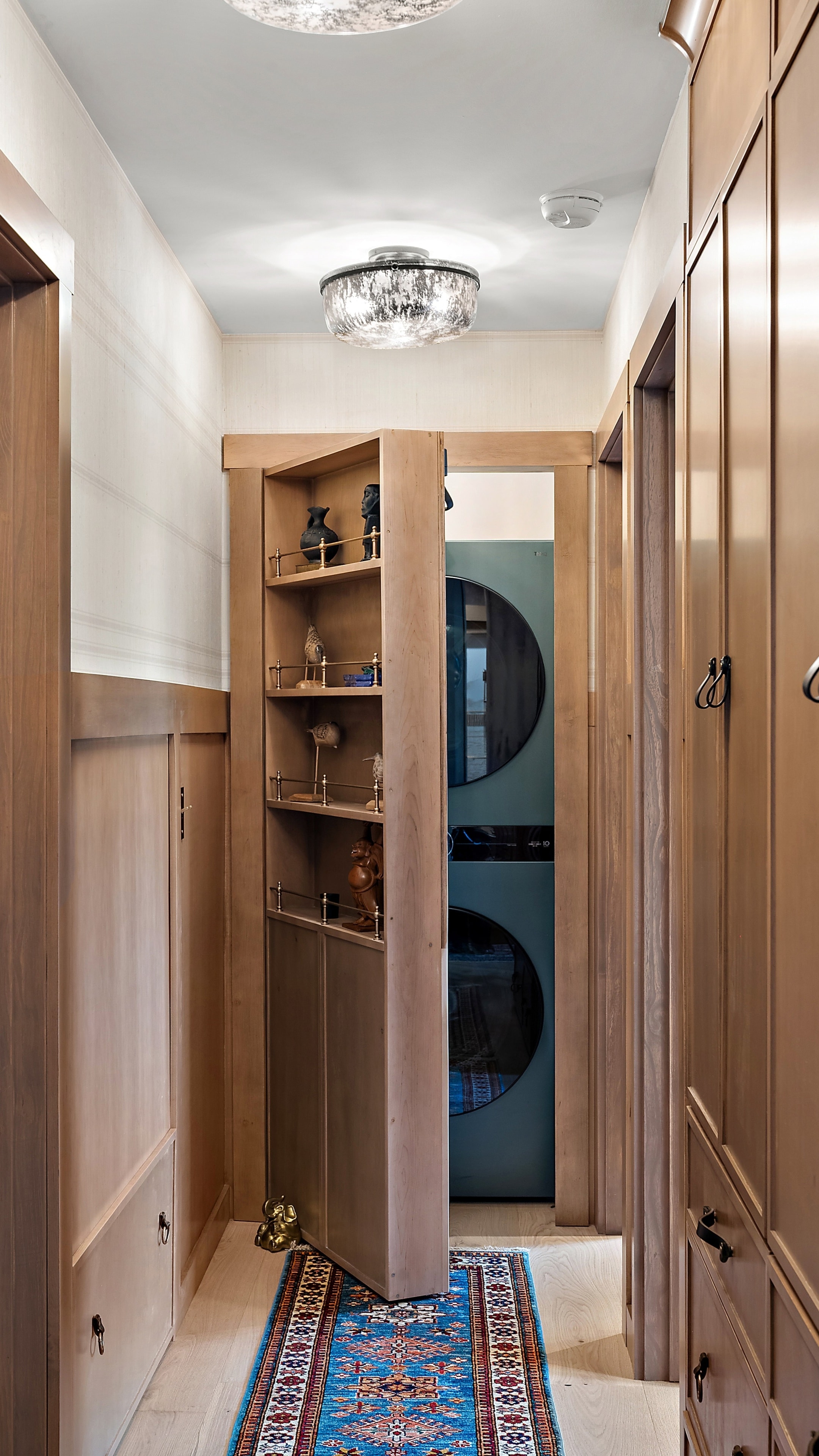 Modern hallway with wooden cabinetry and shelving